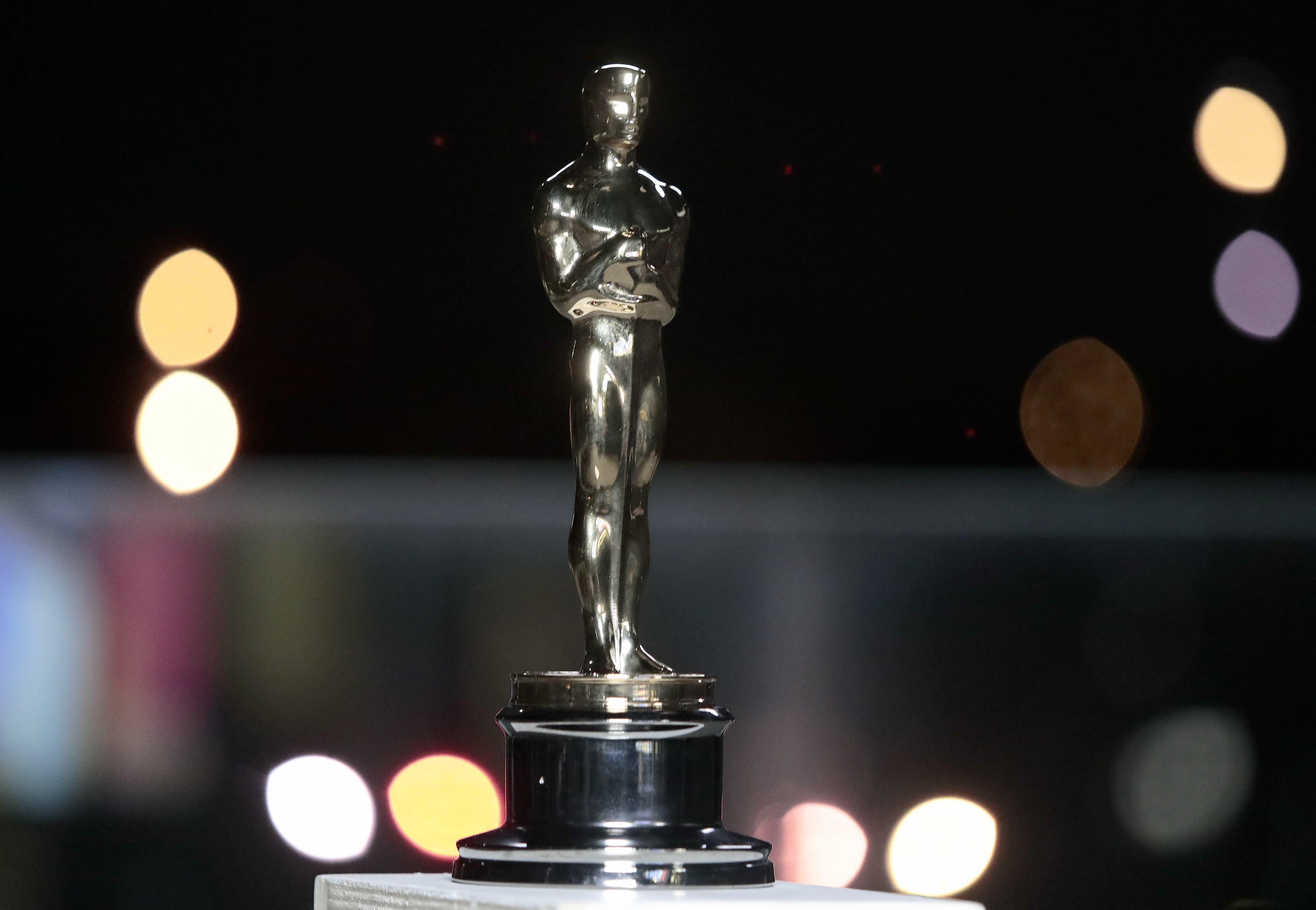 An Oscars statuette on display at a screening of the Oscars on Monday April 26, 2021 in Paris, France. (AP Photo/Lewis Joly, Pool)