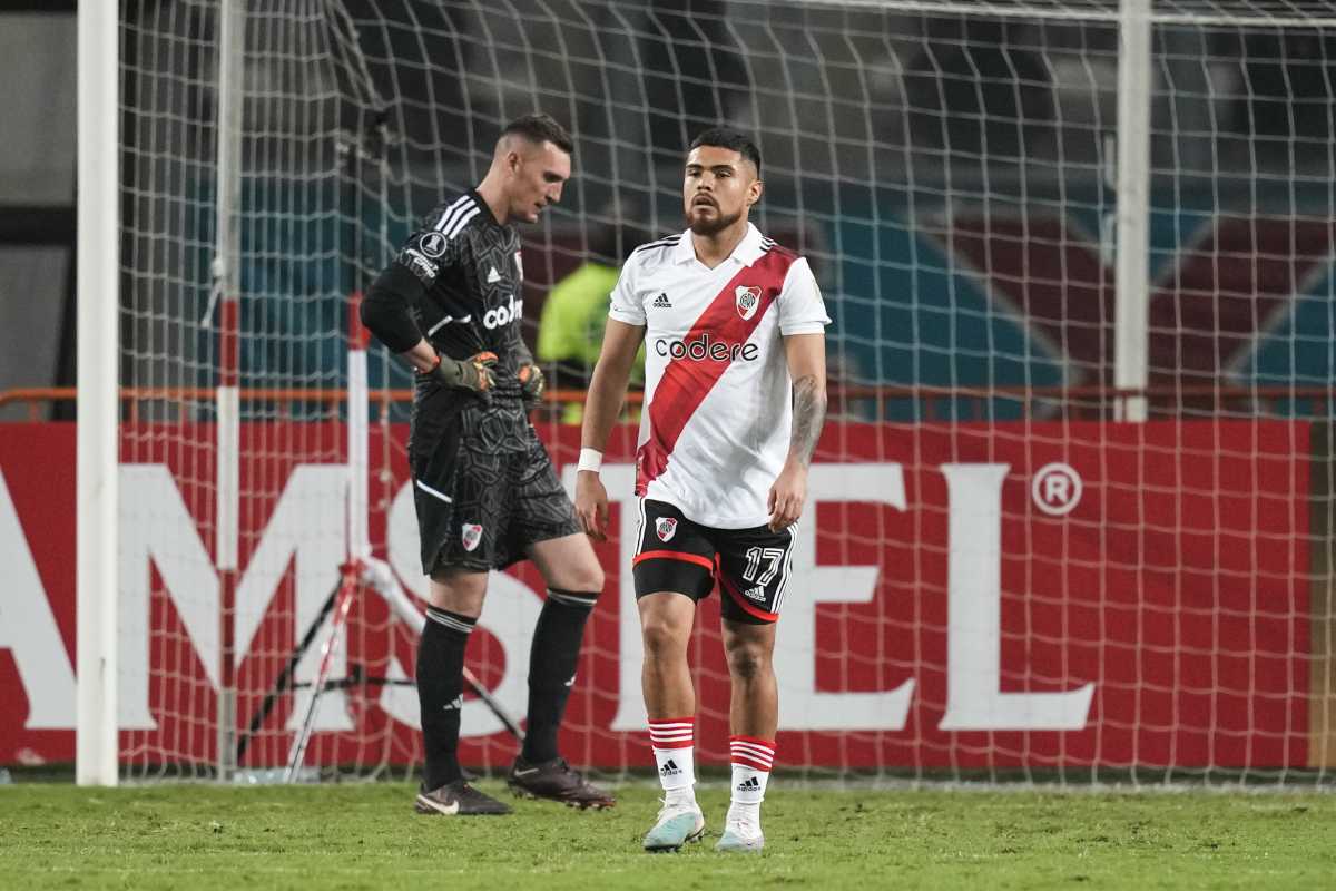 Paulo Diaz , front, and goalkeeper Franco Armani of Argentina's River Plate react after Yoshimar Yotun of Peru's Sporting Cristal scoring his side's opening goal during a Copa Libertadores Group D soccer match at the National Stadium in Lima, Peru, Thursday, May 25, 2023. (AP Photo/Martin Mejia)