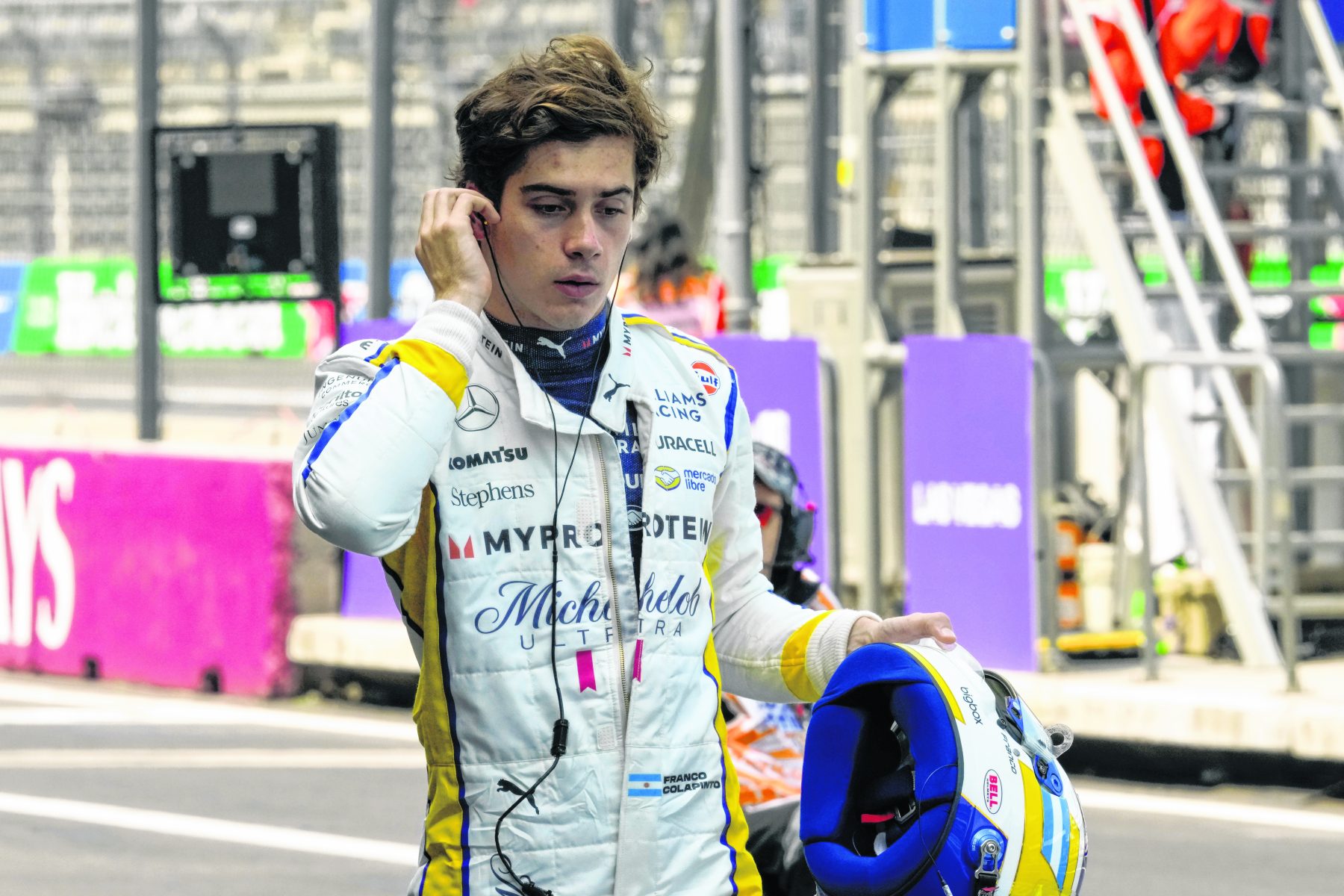 Williams driver Franco Colapinto of Argentina walks through pits during the third free practice ahead of the Formula One Mexico Grand Prix auto race at the Hermanos Rodriguez racetrack in Mexico City, Saturday, Oct. 26, 2024. (AP Photo/Moises Castillo)