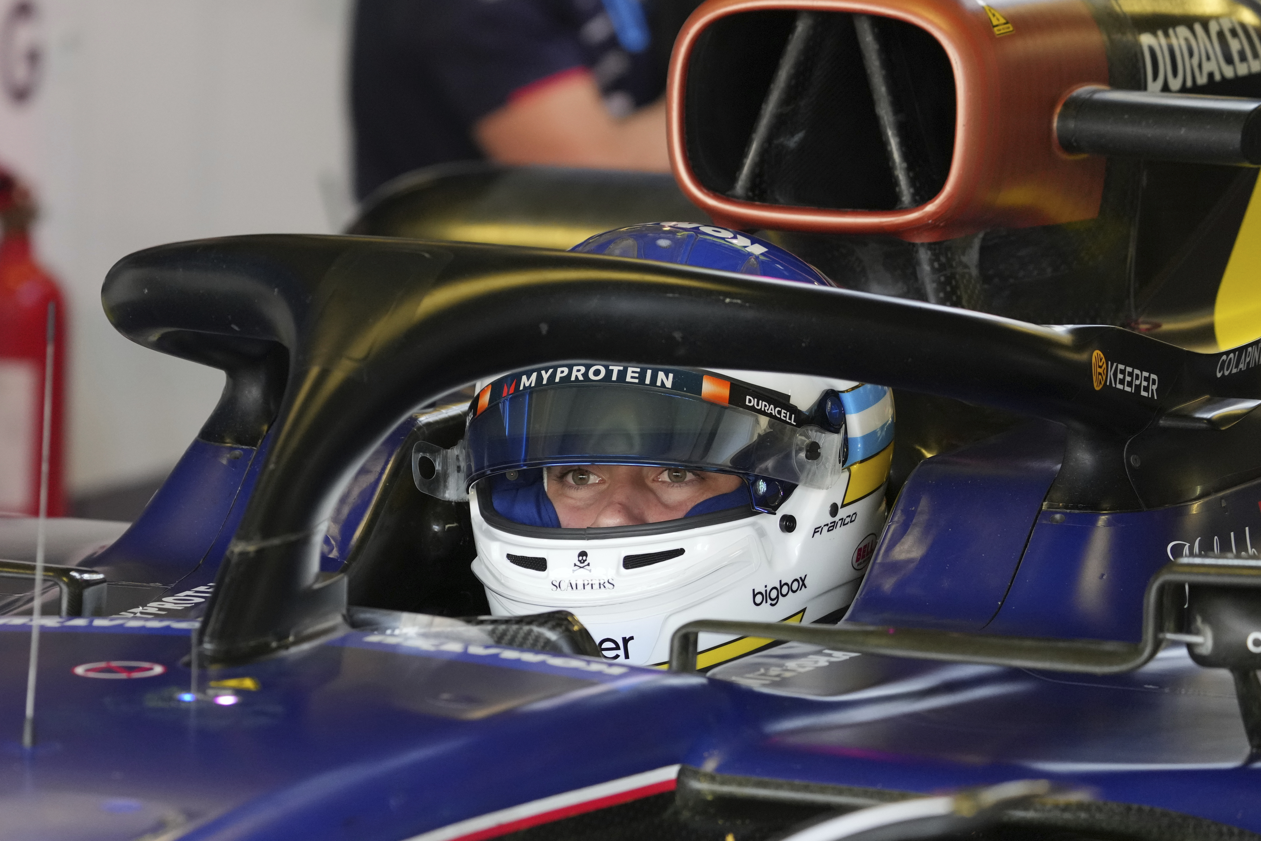 Williams driver Franco Colapinto, of Argentina, sits in his car during the second free practice ahead of the Formula One Mexico Grand Prix auto race at the Hermanos Rodriguez racetrack in Mexico City, Friday, Oct. 25, 2024. (AP Photo/Fernando Llano)