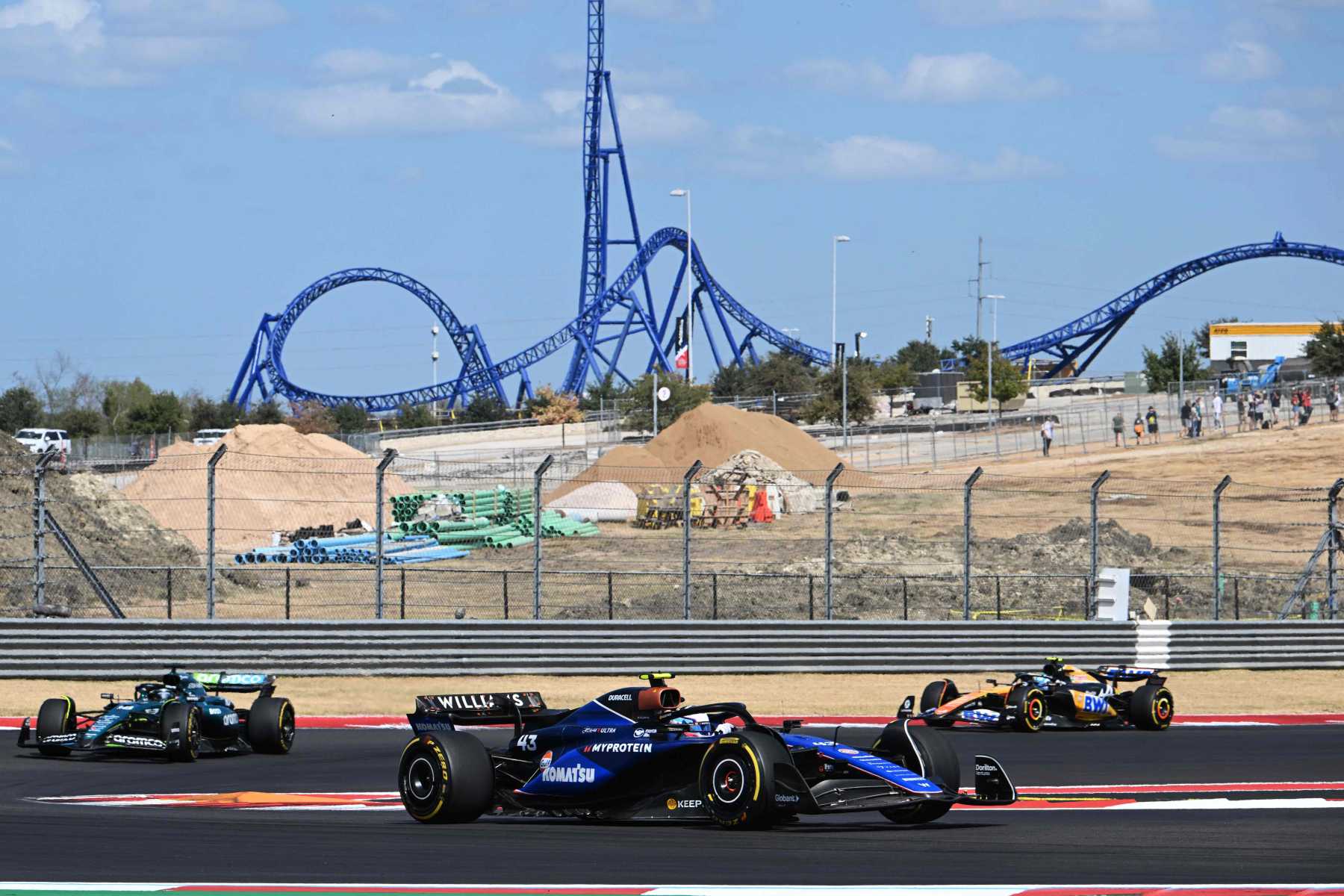 AUSTIN, TEXAS - OCTOBER 19: Franco Colapinto of Argentina driving the (45) Williams FW45 Mercedes leads Lance Stroll of Canada driving the (18) Aston Martin AMR24 Mercedes on track during the Sprint ahead of the F1 Grand Prix of United States at Circuit of The Americas on October 19, 2024 in Austin, Texas.   Mark Sutton/Getty Images/AFP (Photo by Mark Sutton / GETTY IMAGES NORTH AMERICA / Getty Images via AFP)