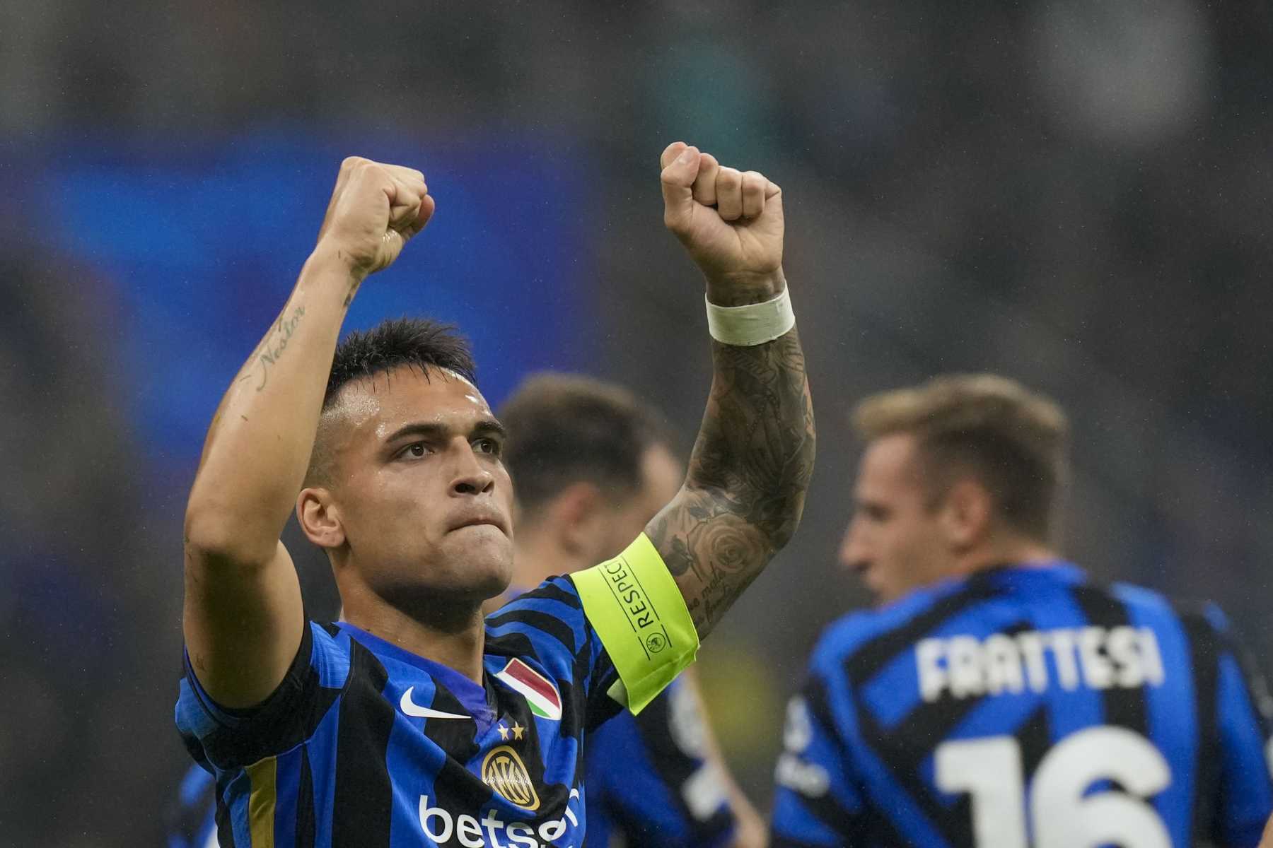 Inter Milan's Lautaro Martinez celebrates after scoring his side's third goal during the Champions League opening phase soccer match between Inter Milan and Red Star, at the San Siro stadium in Milan, Italy, Tuesday, Oct. 1, 2024. (AP Photo/Luca Bruno)