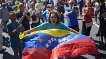 Imagen de Oficialismo y oposición se miden en las calles de Venezuela en víspera de la asunción presidencial